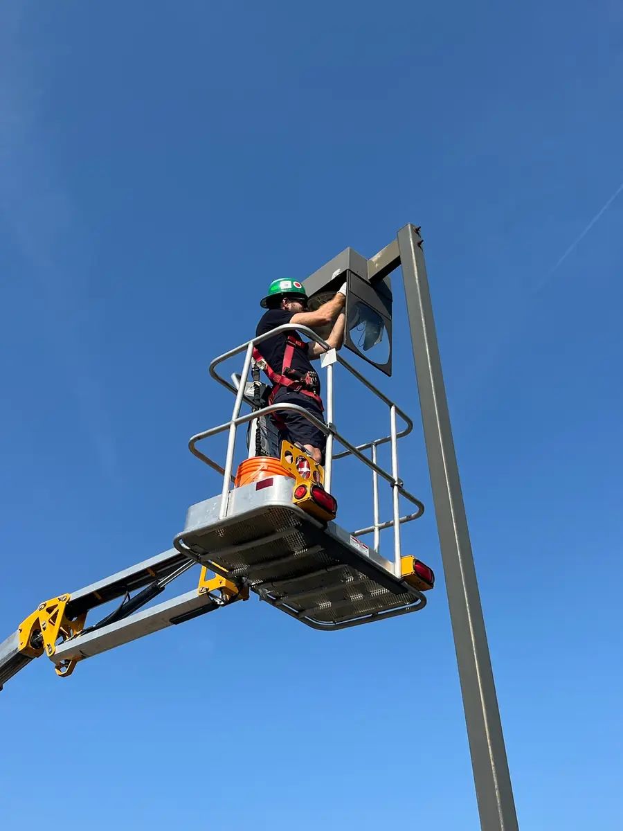 95 Electric completing a commercial outdoor electrical installation